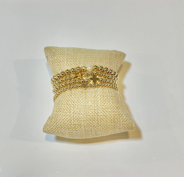 18 kt stack of 4 bracelets